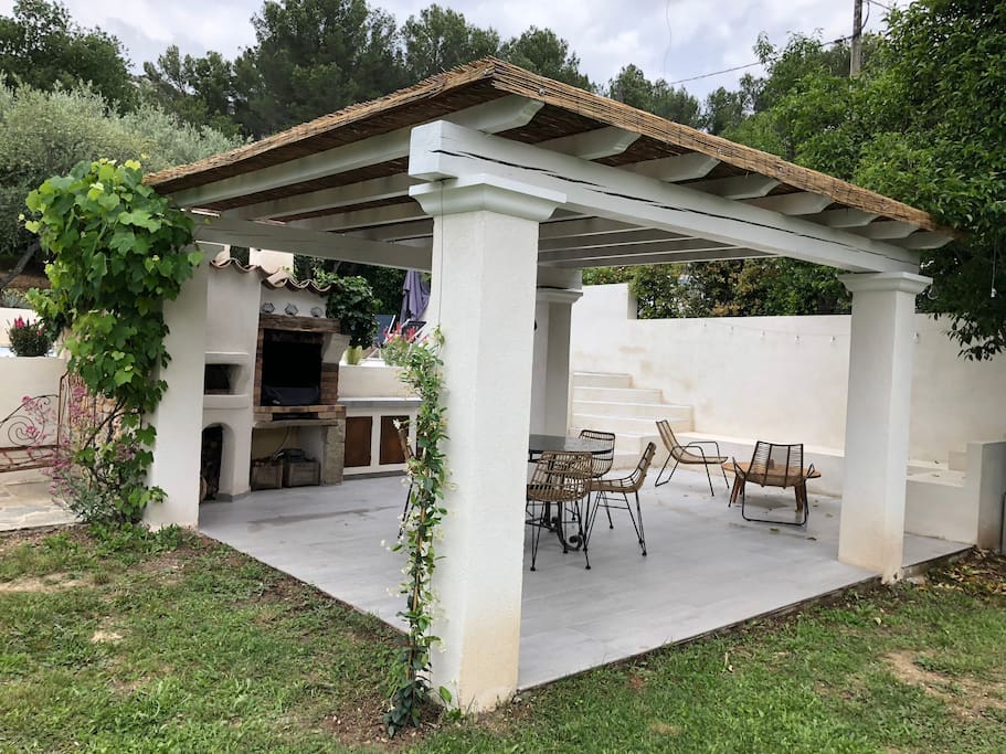 Summer kitchen with plancha and pizza oven