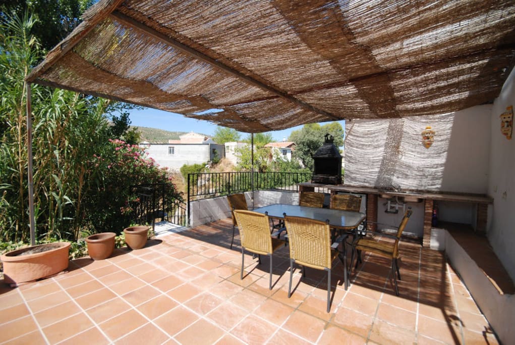 Outdoor kitchen and upper patio