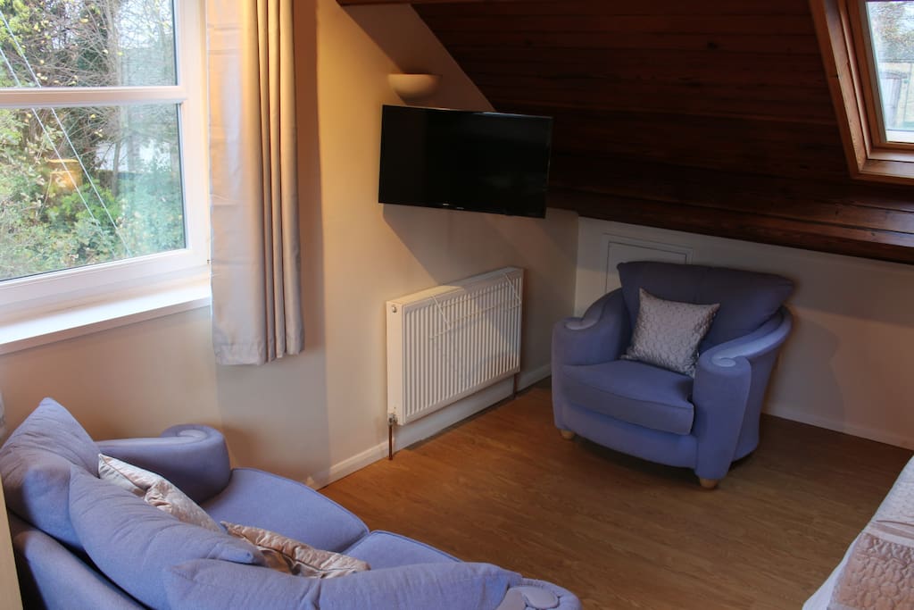 2 Seater Sofa and Chair with Smart TV.