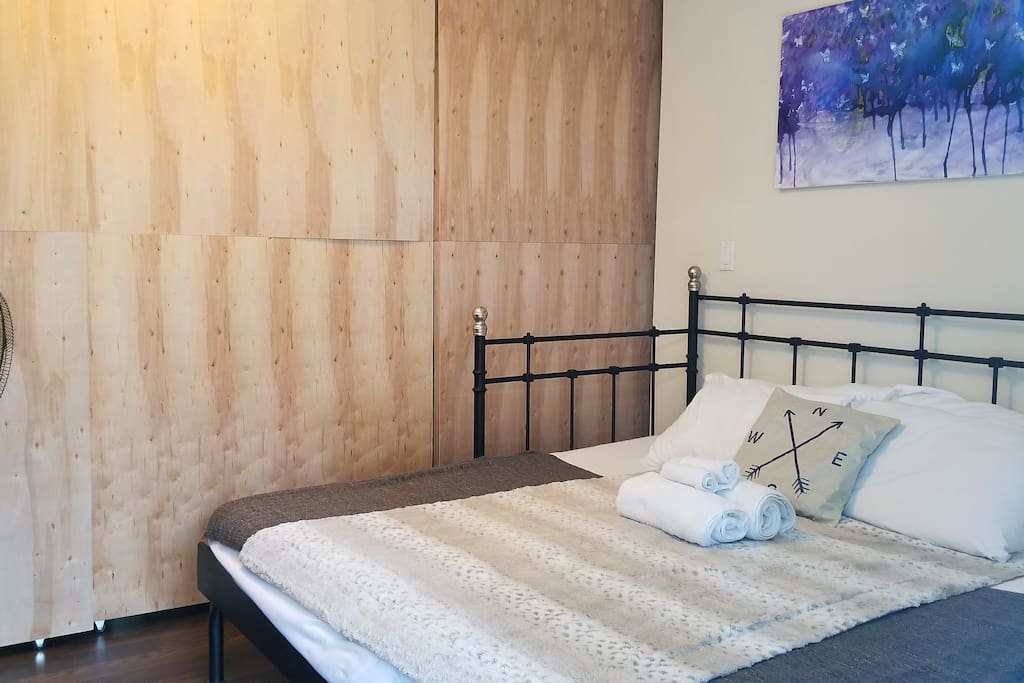 Den is partitioned by floor to ceiling sliding doors for complete privacy