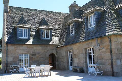 Breton mansion by the sea +lighthouse