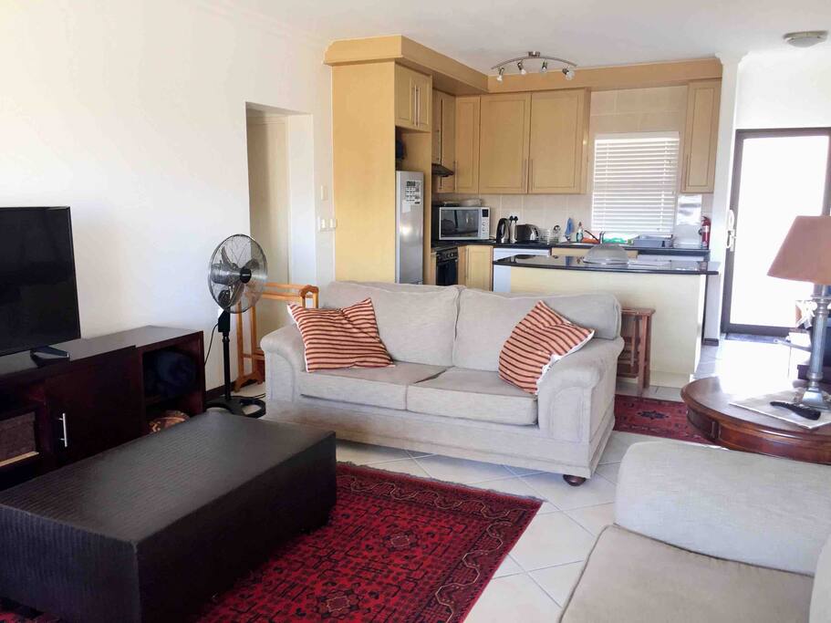 Lounge & kitchen with curtains open