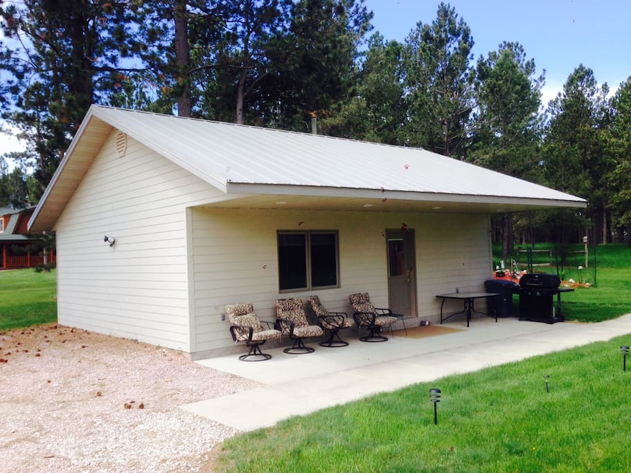 Cabin with covered patio. Includes gas grill for your use