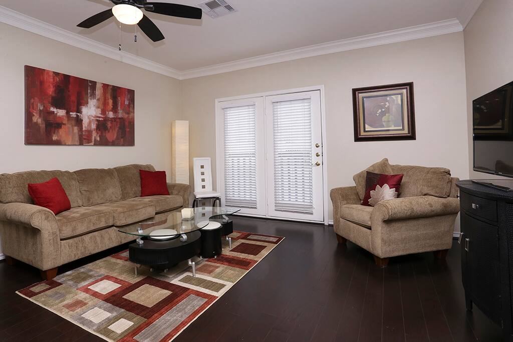 Bright living room with and TV