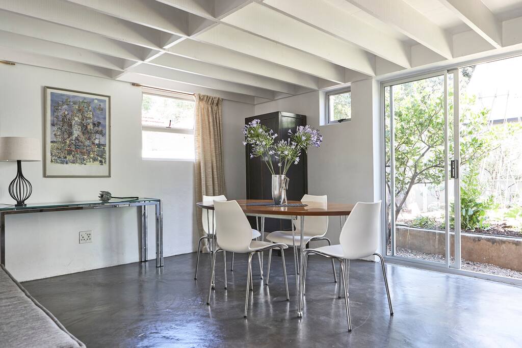 Dining area with table that seats up to eight