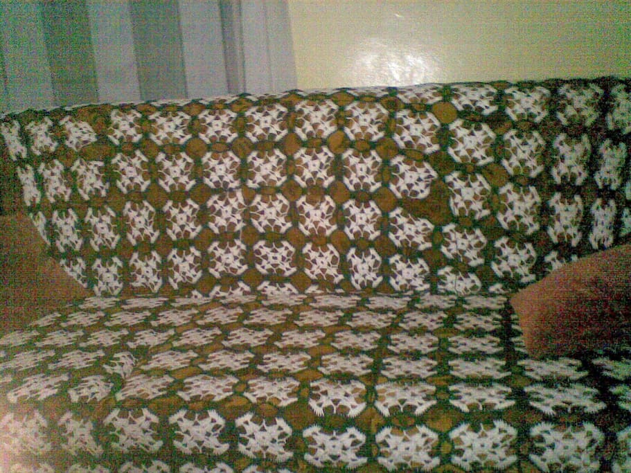 Comfortable Couch in the sitting room of the four bedroom house