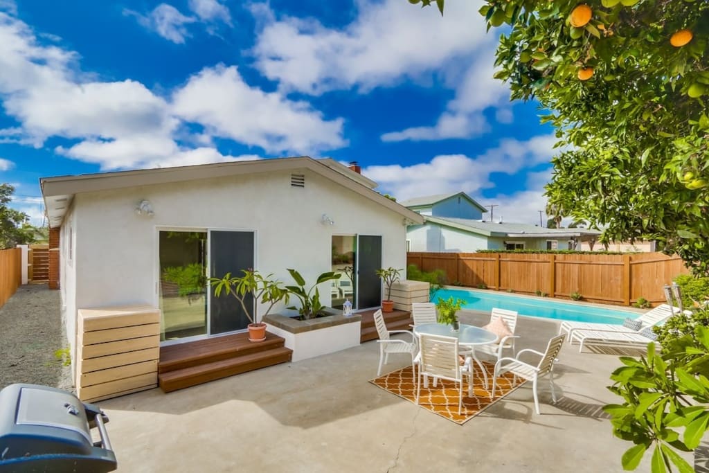 Private back courtyard. Sliding glass door on the right is the private locked entry for the primary bedroom in this listing.