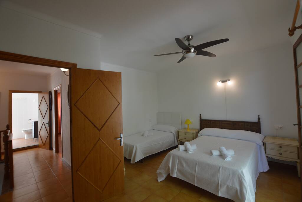 Bedroom 1: 1 king size bed and 1 individual bed. Upstairs