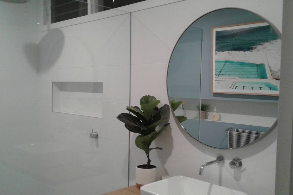 Tranquil bathroom with rain shower