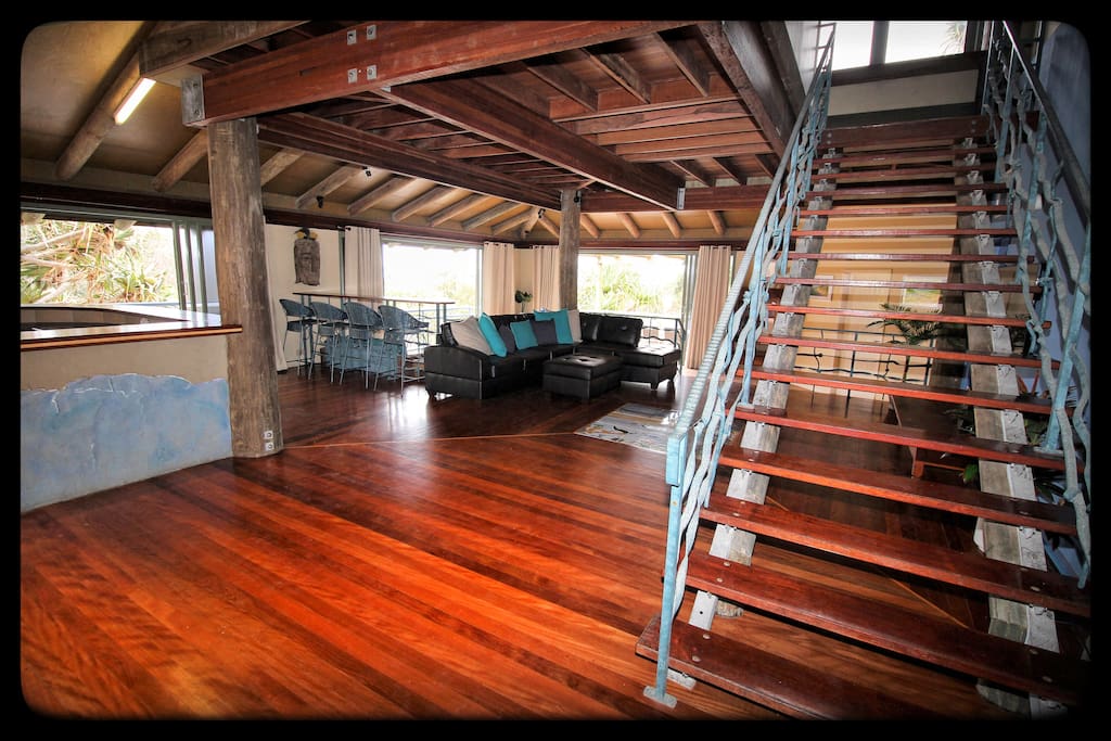 Open plan living, staircase to loft retreat