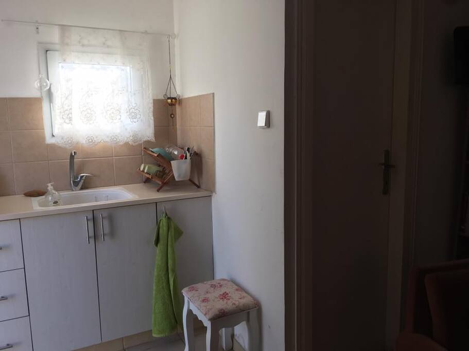 small kitchen next to the shower