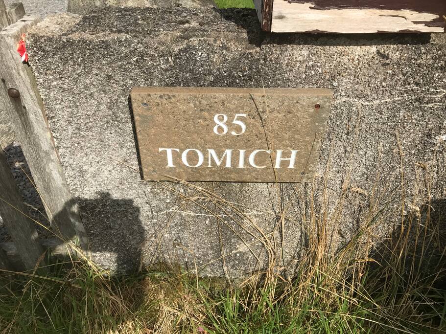 Sign on wall at entrance