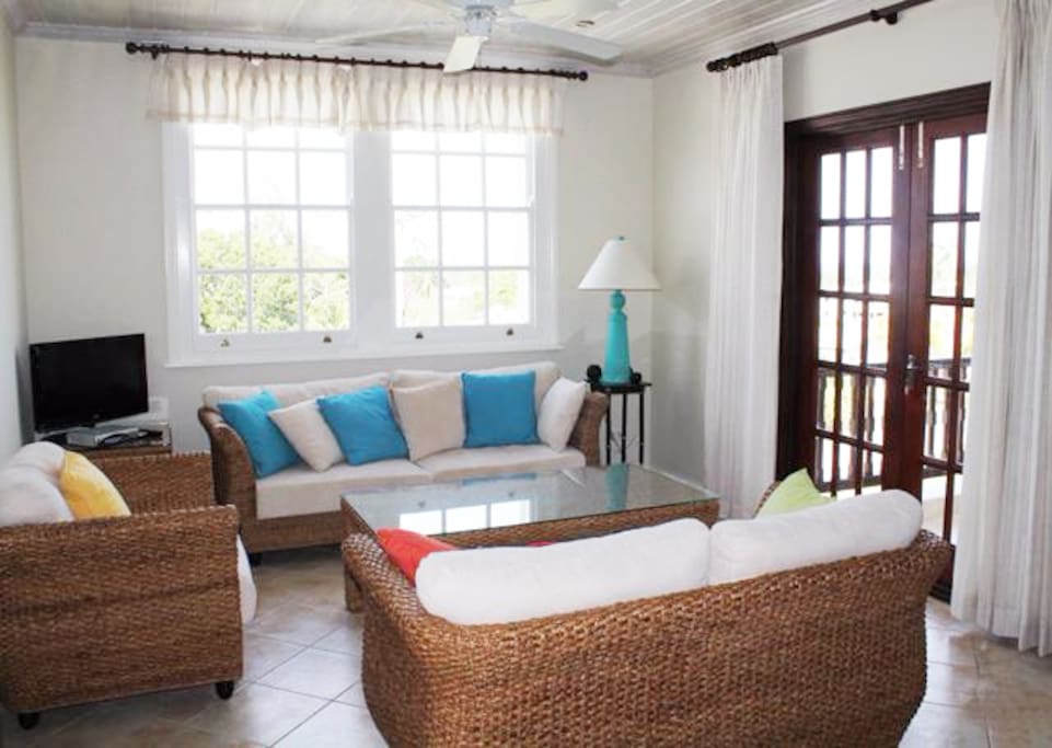 Living area with access to large balcony
