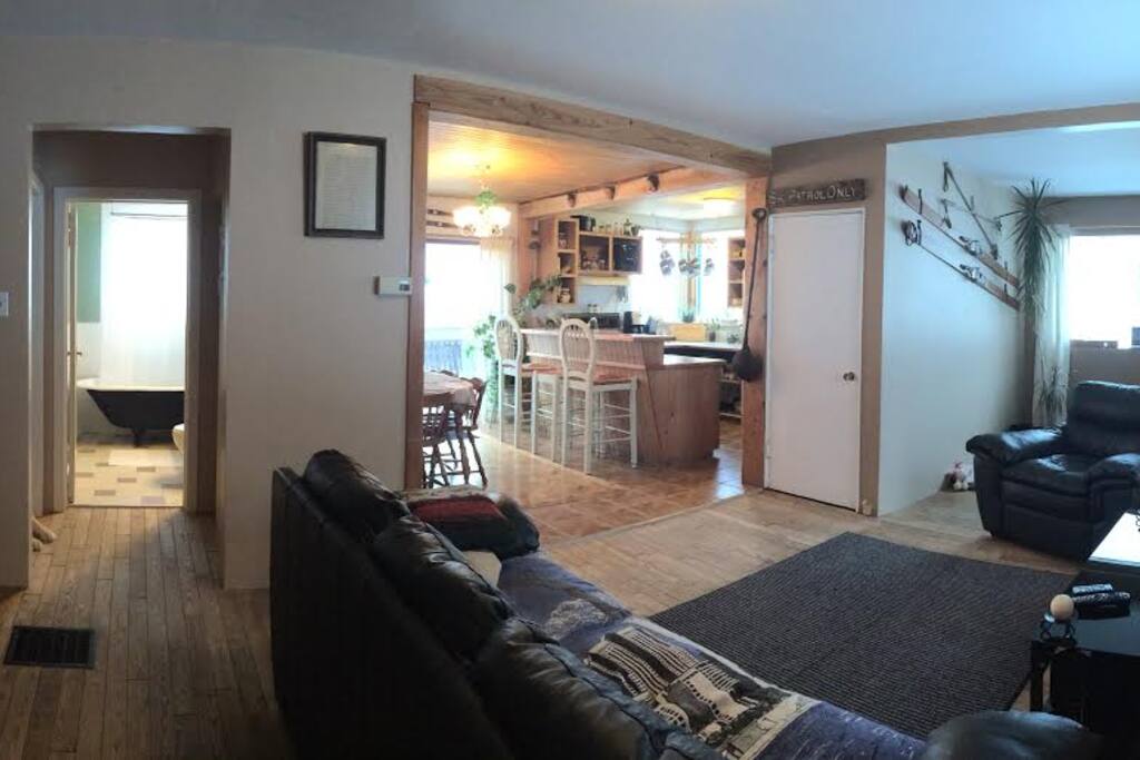 Living room with kitchen in background