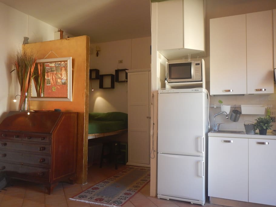 Zona notte e angolo cucina