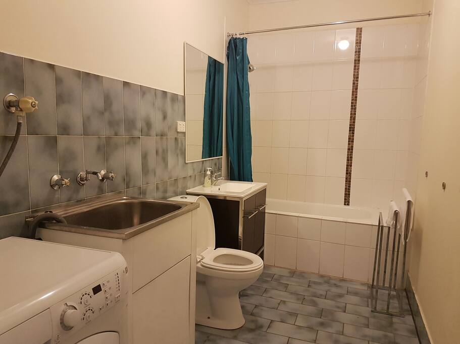 bathroom with washing machine