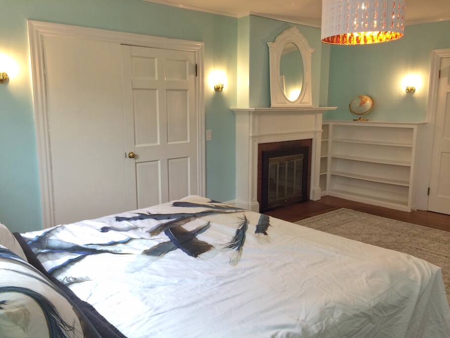 Fireplace in the king bedroom. (Decorative only.)