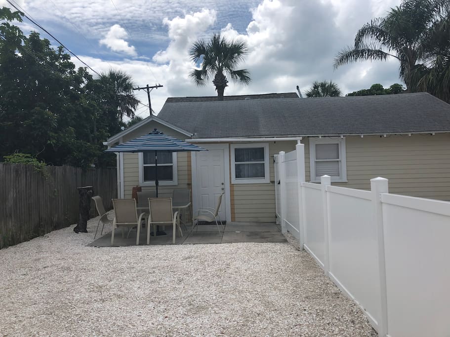 Outdoor seating area with privacy fence