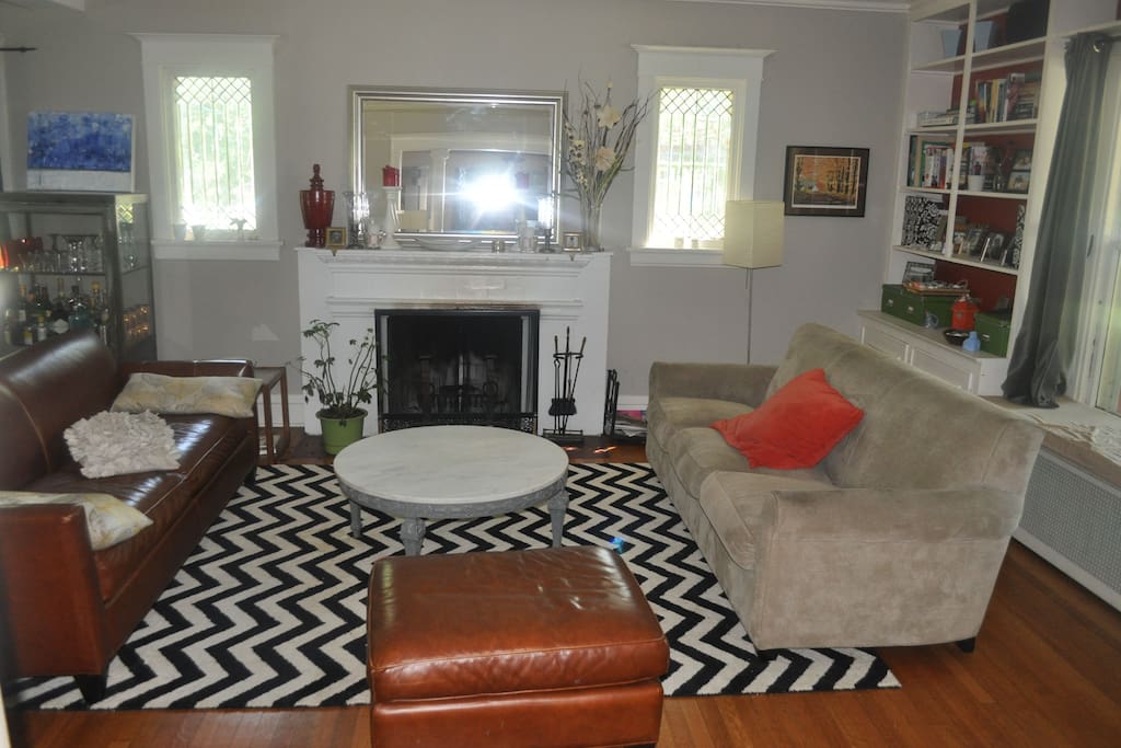 Formal living room with wood burning fireplace