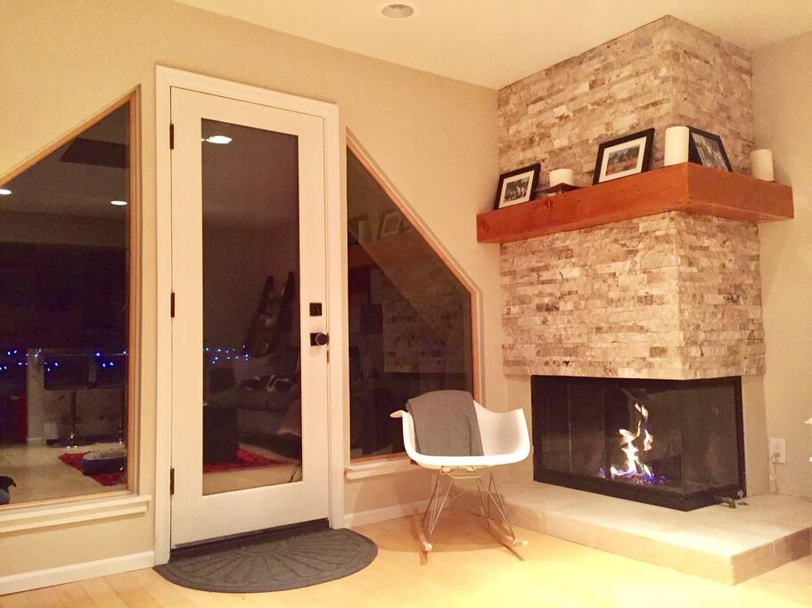 Rocking chair next to the gas fireplace