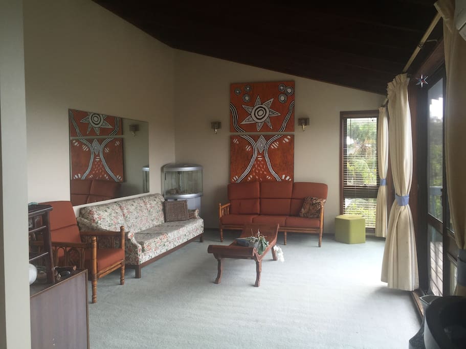 Upstairs lounge room. Expansive views from balcony adjoining. Very bright East (sun-rise) facing.