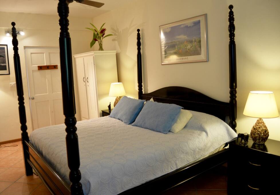 Four poster bed to end your fulfilled caribbean day.