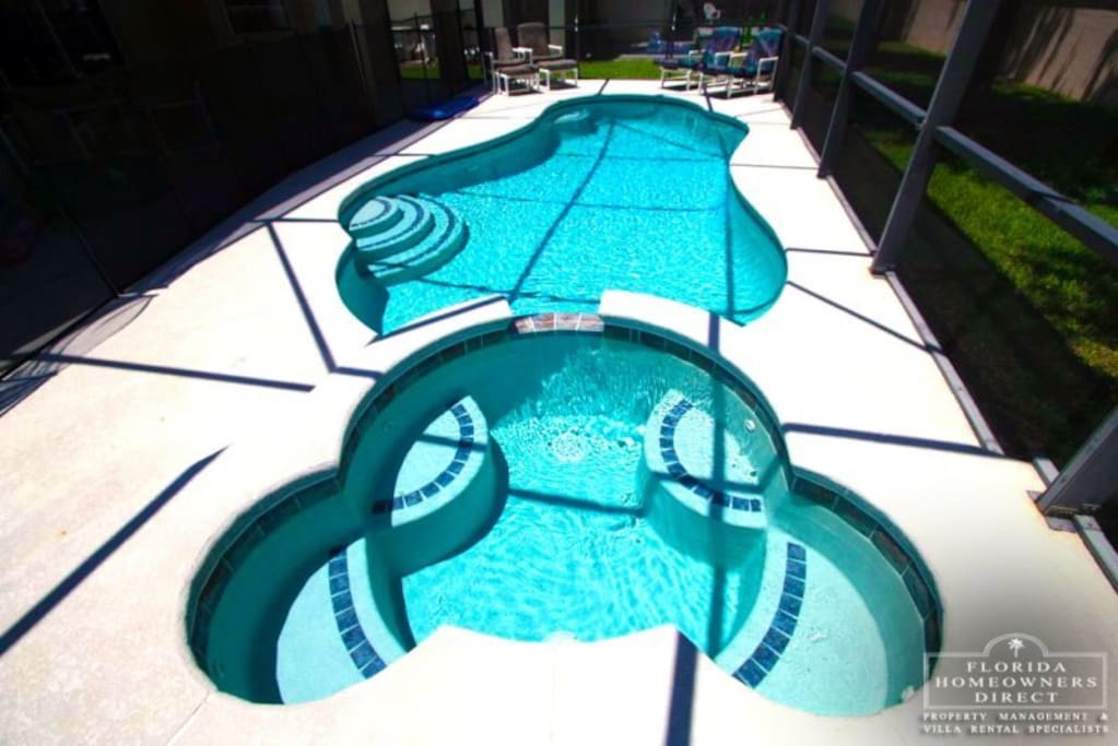 Enjoy the Florida Sun while sipping a cool lemonade in this crystal clear pool.