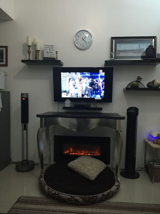 42 inches tv, audio tower, ambient fireplace