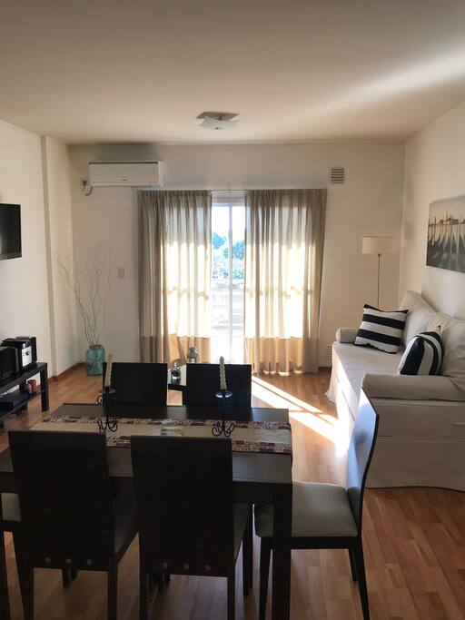 Spacious living with a sofa bed, TV and Air conditioned. balcony with a view.