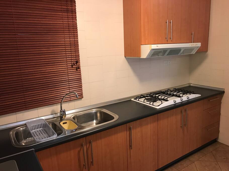 Fully equip kitchen with gas stove and oven