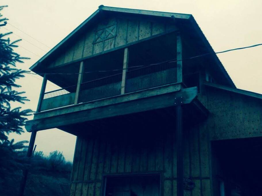 the back looking up at the rear deck that overlooks mores CREEK canyon