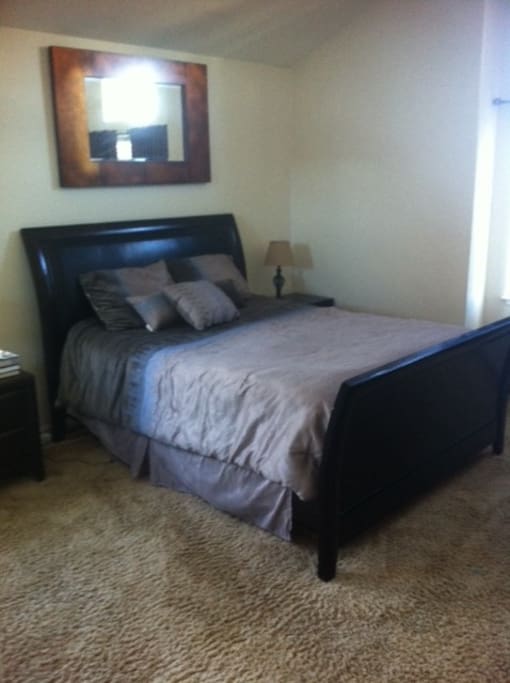 Master bedroom includes wall mounted flat screen, cable and wifi.