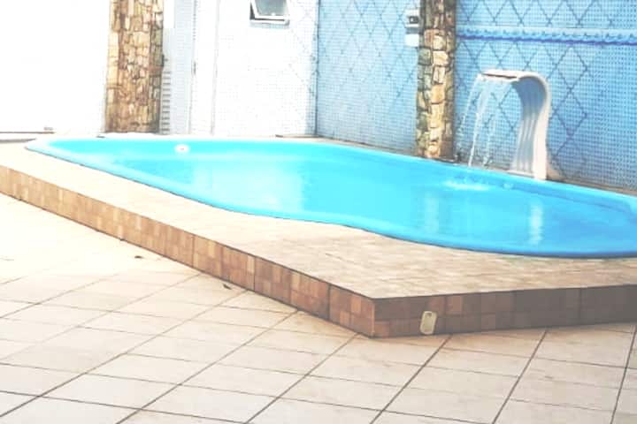 Sobrado with pool and a garage for 4 cars.