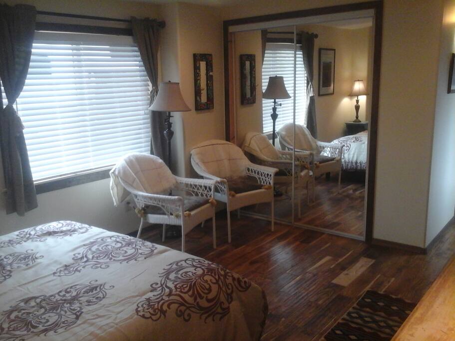 the large closet with a spacious sitting area