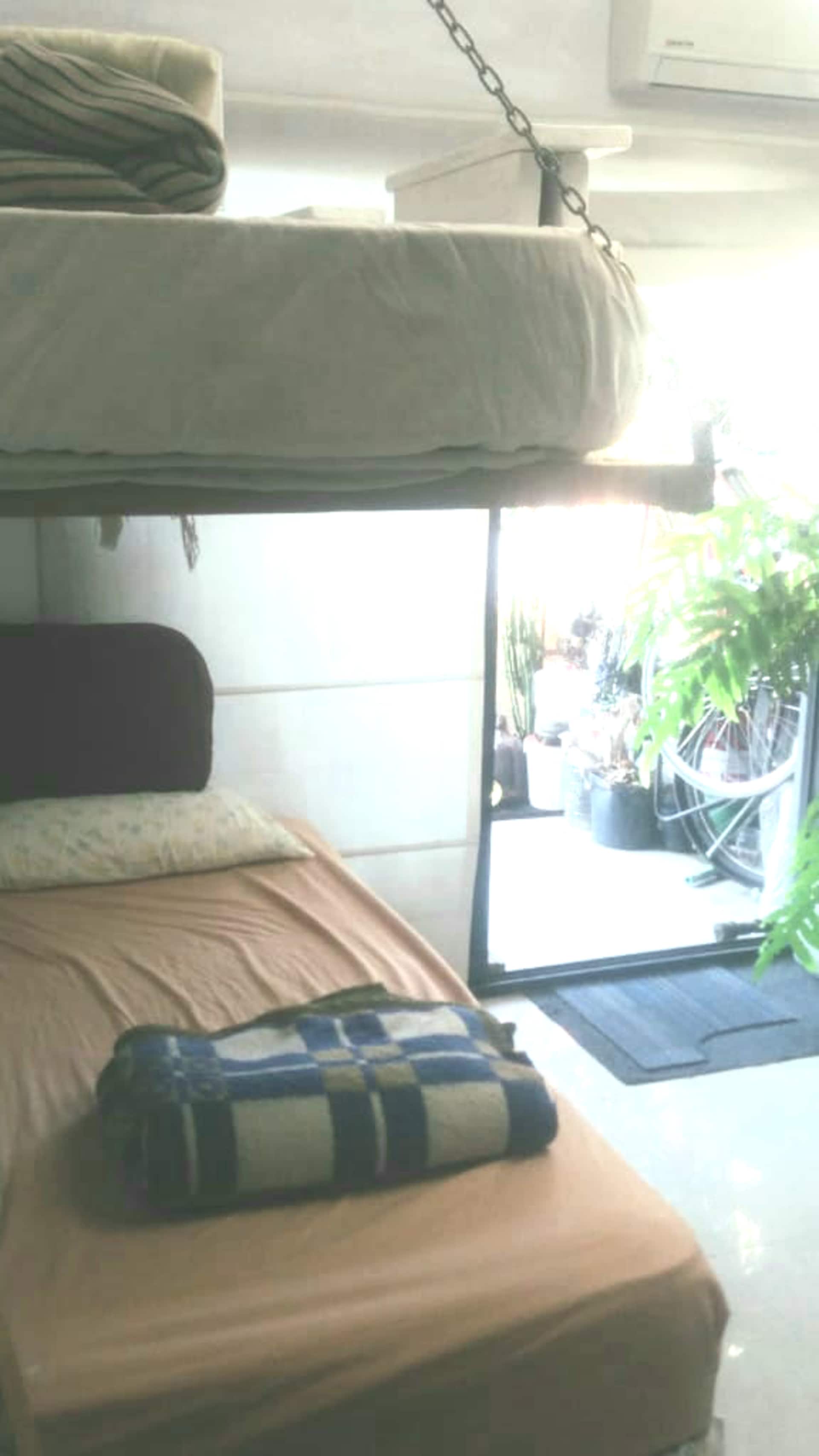 Apartamento studio com cama ou sofá no ambiente em Chacarita