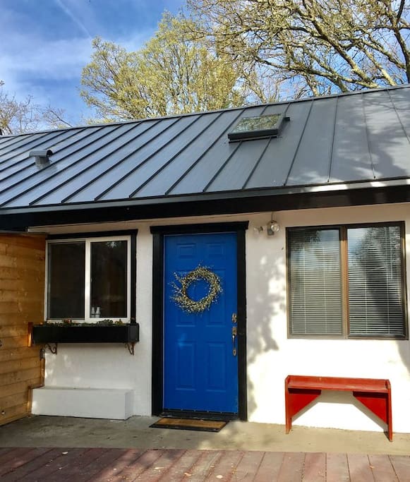 The front door to the Cottage inside your private, gated courtyard.