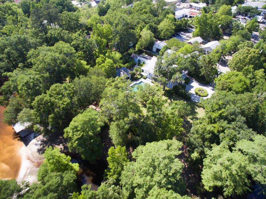Overall aerial view of portion of 12 acres focusing on main house area