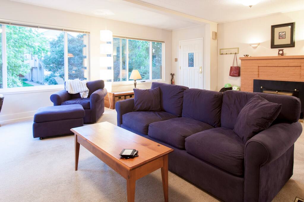 Living Room with TV and Xbox -- Open Floor Plan Living and Dining room with fireplace. Air Mattress available for big groups.