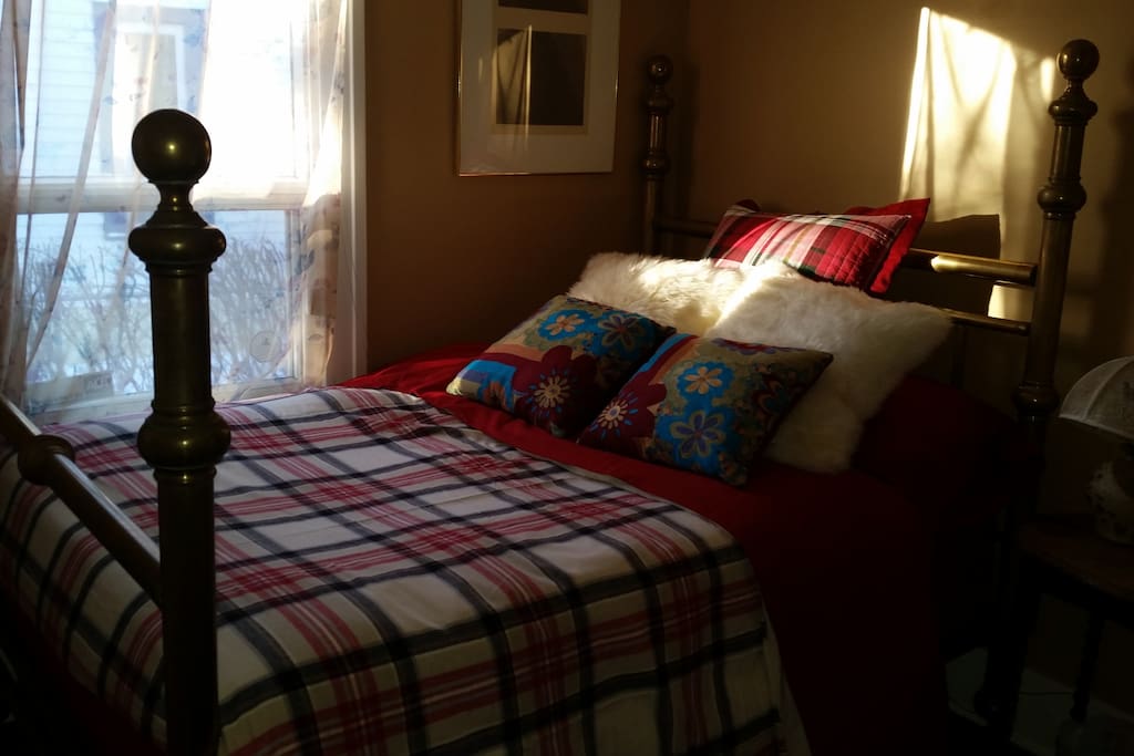 This is the bedroom - it is a brass bed with a very new mattress and boxspring.