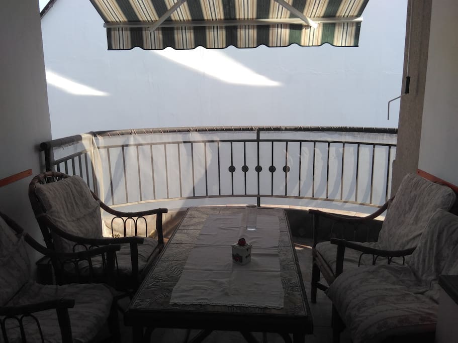 balcony 1 with dining table