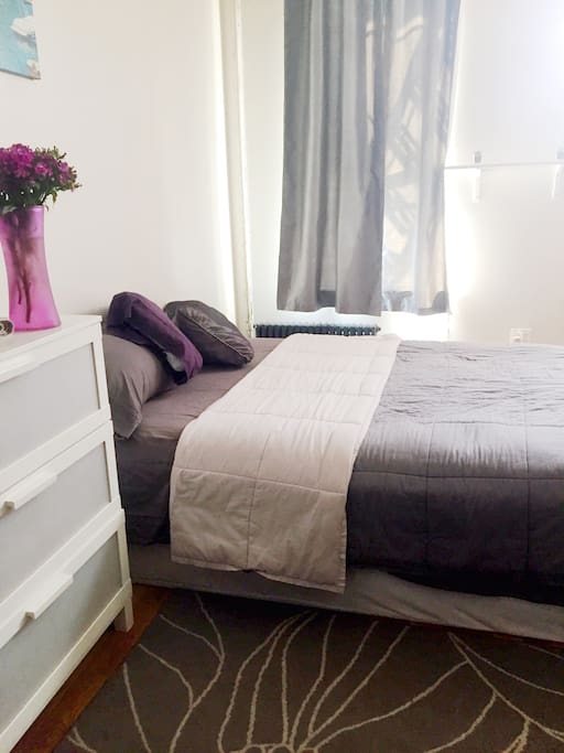 This is just a REAL photo to show how LARGE the bedroom is. You have your own personal entrance/exit (talk about privacy)! This bedroom is just down the corridor from your OWN FULL BATHROOM! Sleep soundly- This Queen Pillowtop mattress awaits you!