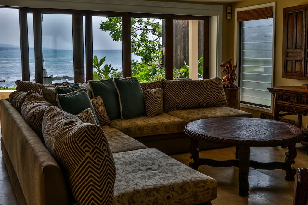 Living Room with large wrap sofa and HD TV