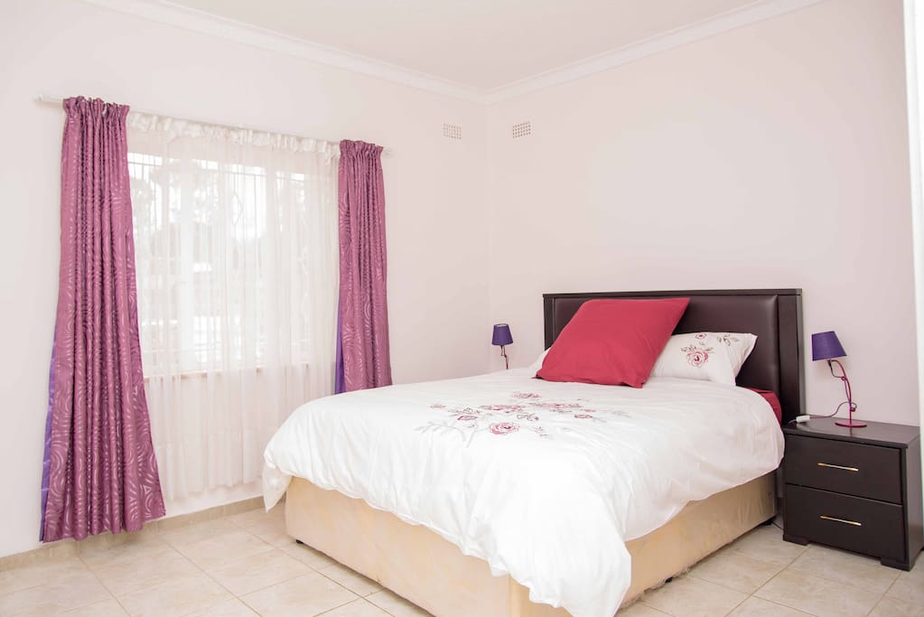 Main bedroom with Queen size bed and cabinets