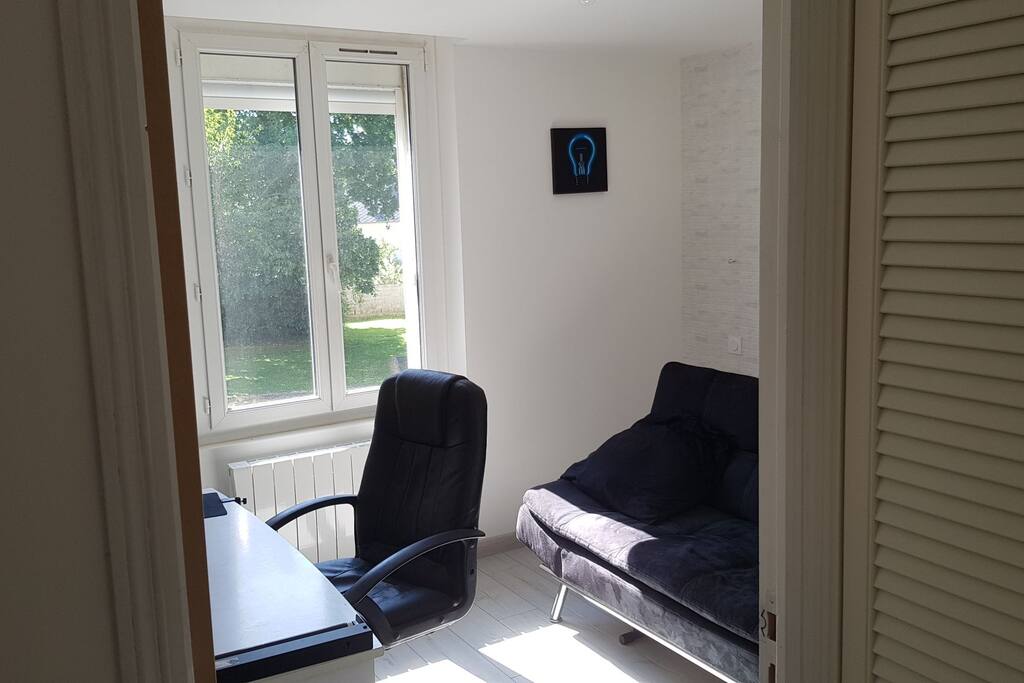 Chambre secondaire avec canapé-lit