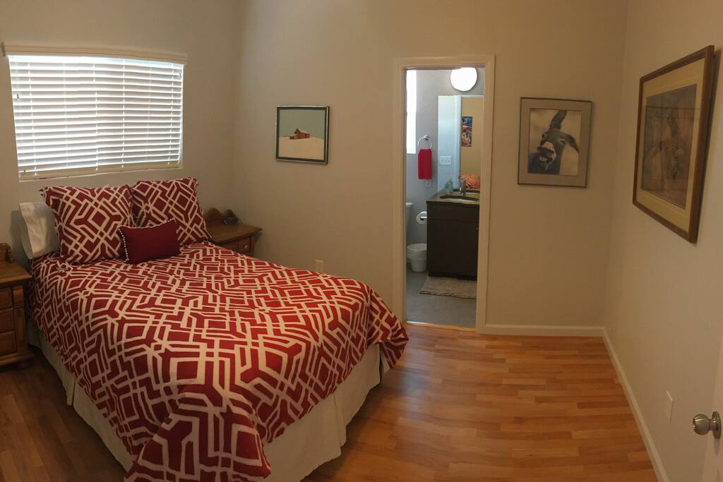 Full size bedroom with private walk in shower.