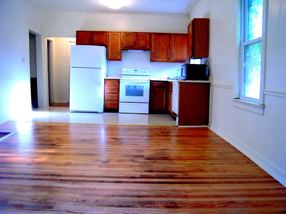Newly finished clean floors and sparkly kitchen.