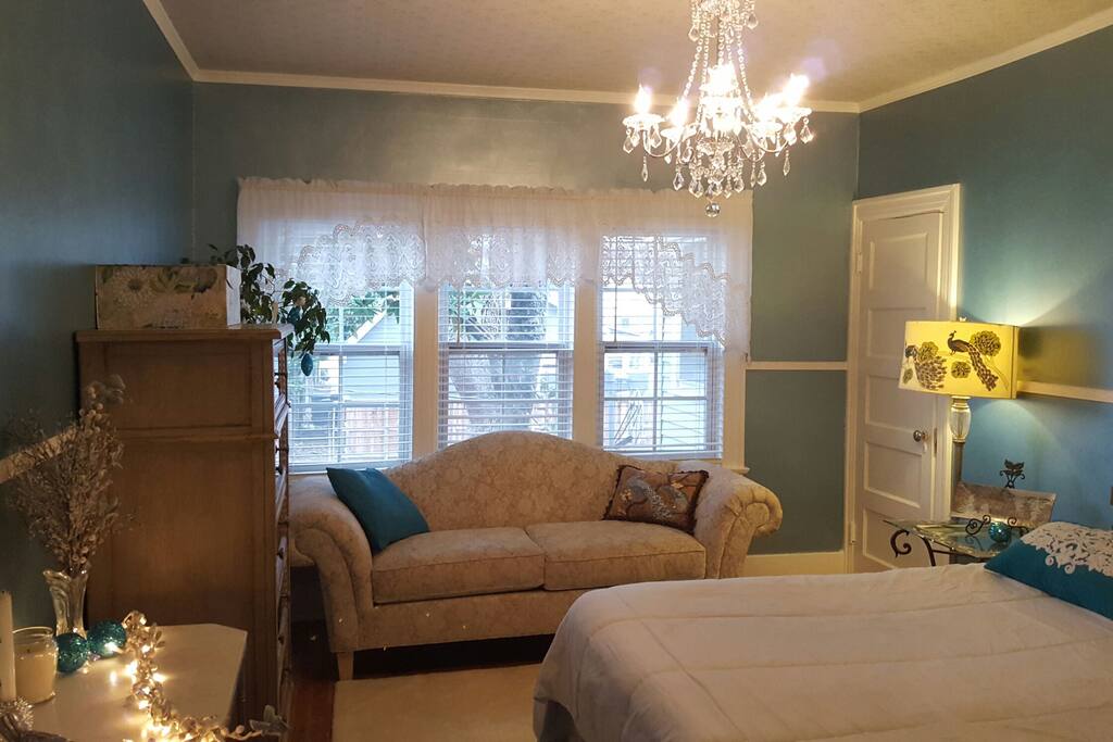 Functional triple windows with custom shades for plenty of fresh air and sunshine!