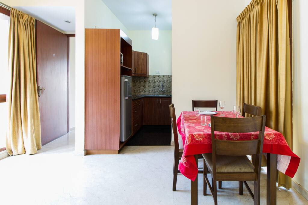 dining table in living room in two bedroomed apartment on middle floor