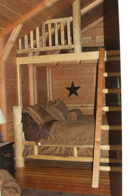 Cabin is a studio, offering a queen bed below and a double bed in the loft.