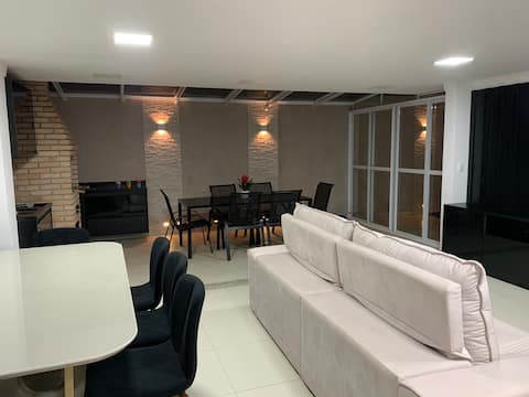 Top performing Airbnb: Triplex house with private pool in a gated community in Guarujá